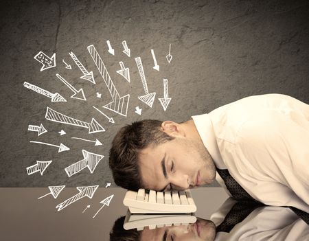 An exhausted business person resting his head on keyboard with pressure illustrated by arrows pointing at him concept