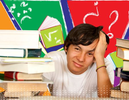 Tired male student with books around him