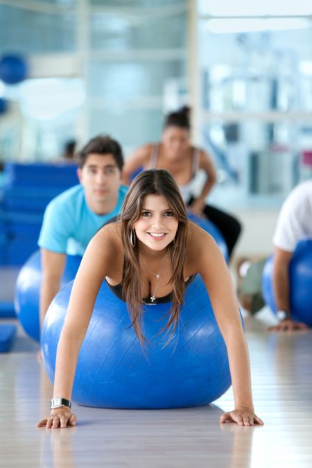 Group of people at a pilates class at the gym