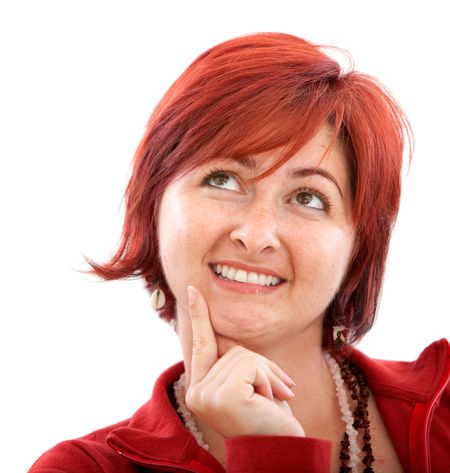 Thougthful woman with red hair isolated over white