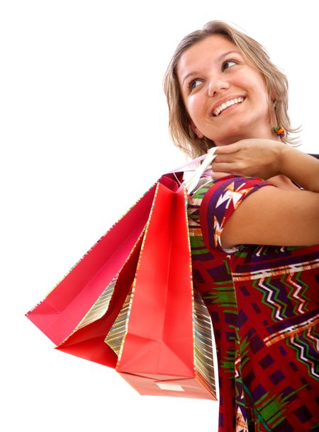 Woman with shopping bags isolated over white