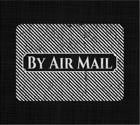 By Air Mail written on a chalkboard