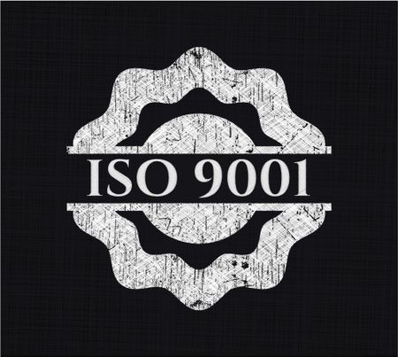 ISO 9001 written on a blackboard