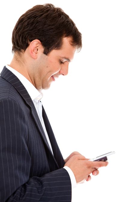 Business man texting a message on his phone isolated