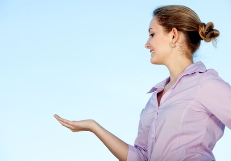 Woman with her hand outstretched aking for money isolated