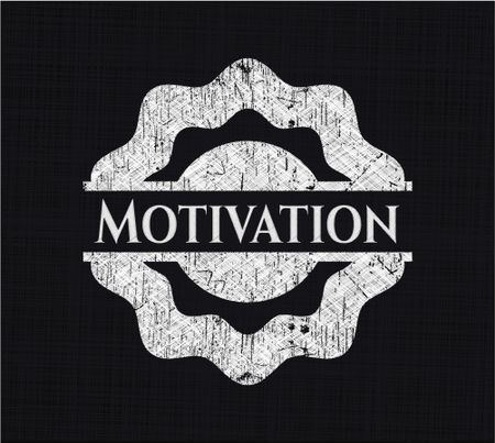 Motivation chalkboard emblem on black board