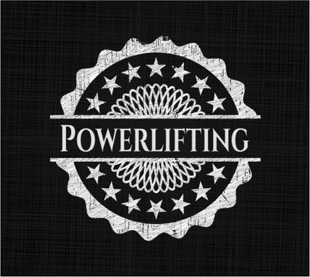 Powerlifting chalk emblem written on a blackboard