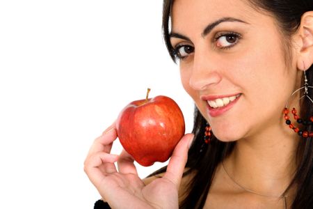 girl holding an apple over a white background