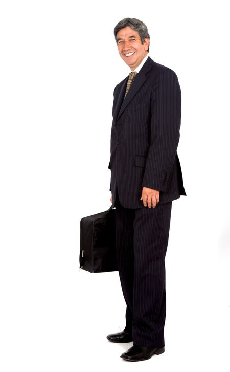 business man standing with a briefcase over a white background