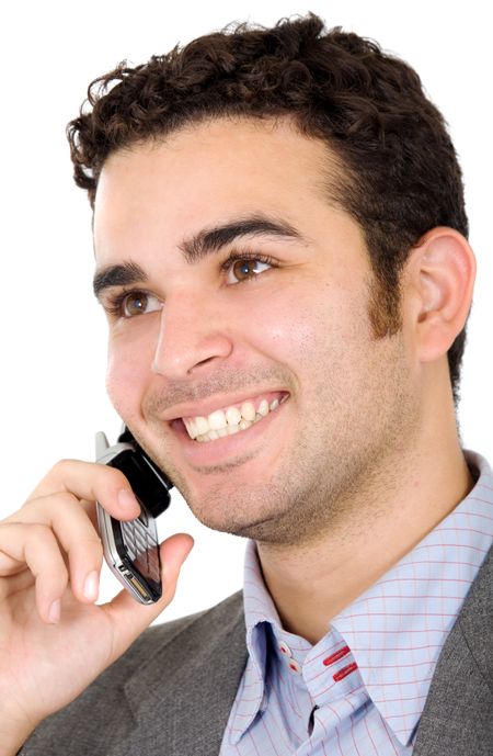 Business man on the phone smiling - isolated over a white background