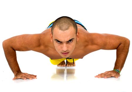 man doing pushups over a reflective white background