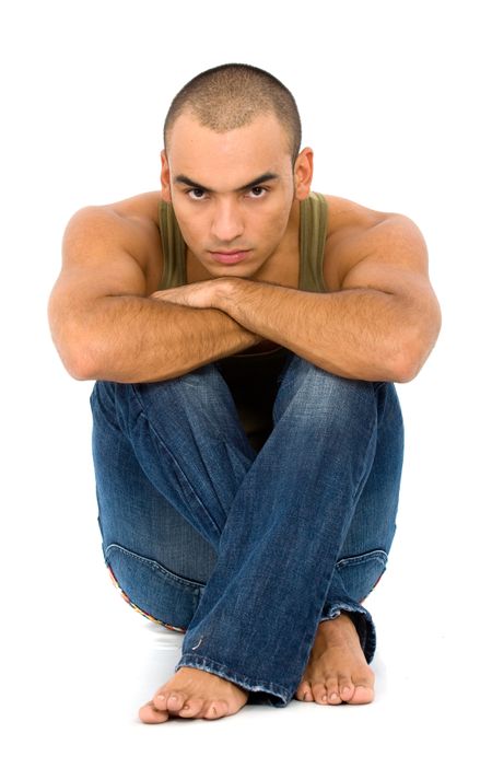 casual man portrait on the floor - isolated over a white background