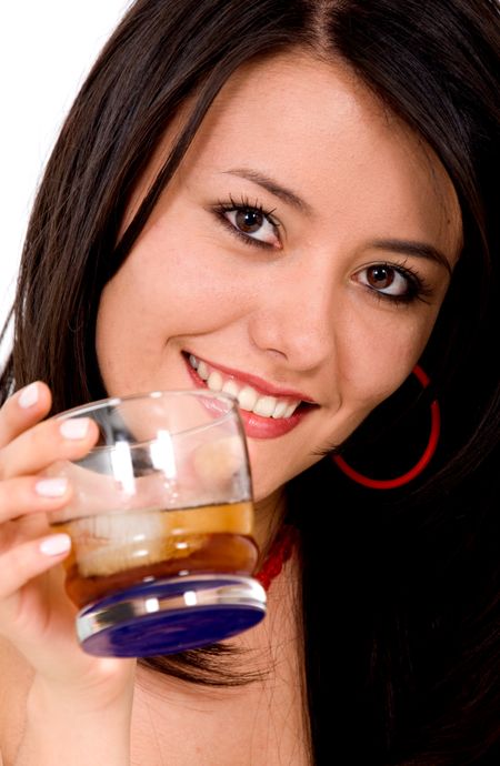 beautiful girl with a drink on her hand - smiling over a white background