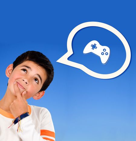 Boy thinking on video games isolated over blue