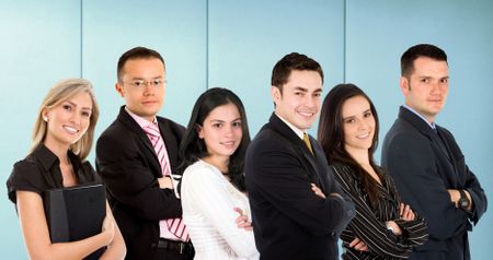 Group of business people at an office smiling