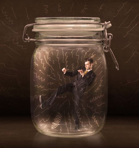 Businessman inside a jar with powerful hand drawn lines concept on bakcground