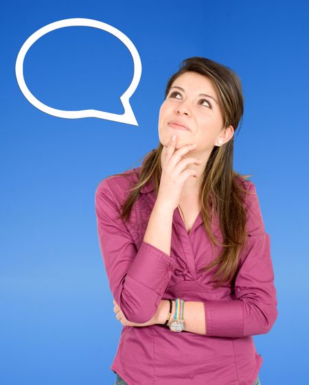 Thoughtful casual girl isolated over a blue background