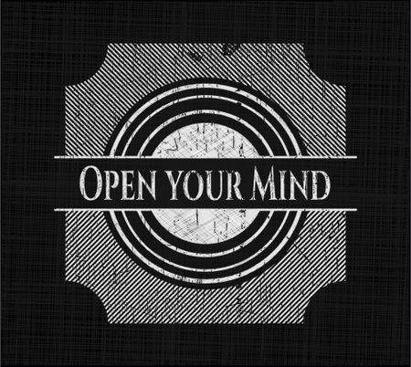 Open your Mind chalk emblem written on a blackboard