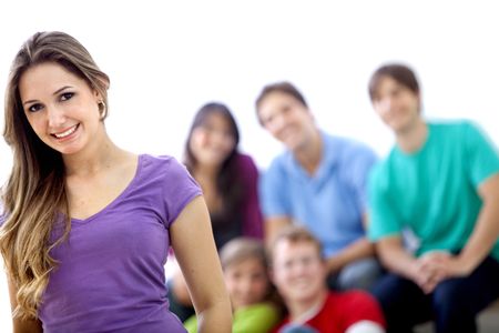 Beautiful woman in front of a group isolated