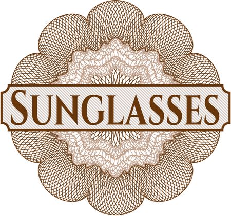 Sunglasses golden emblem or badge