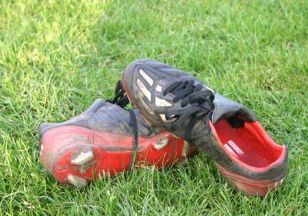 football boots on the floor after a football match