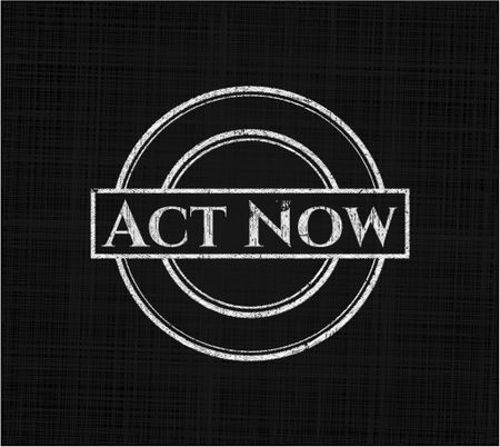 Act Now written on a blackboard