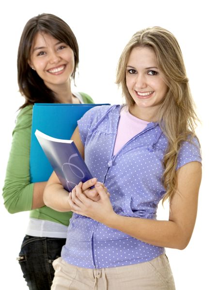 Happy female students with books isolated over white