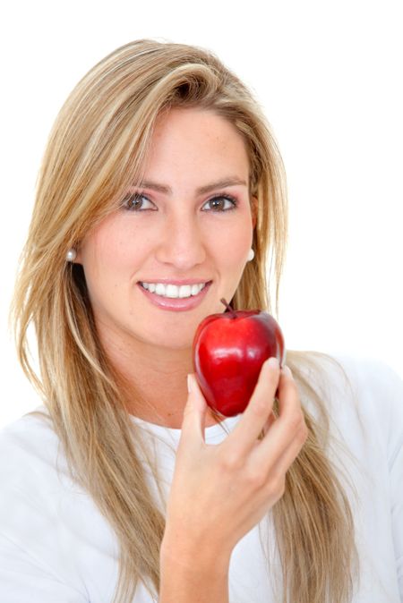 Beautiful woman's portrait with a red apple isolated