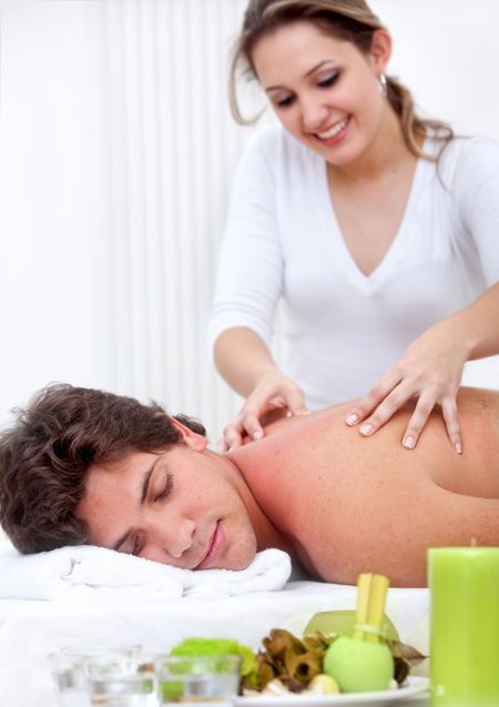 Man at a spa getting a stress-free massage