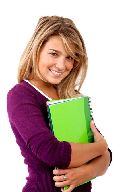 Beautiful student holding a notebook isolated over white