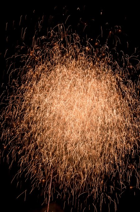 Cloud of sparks from burst of fireworks