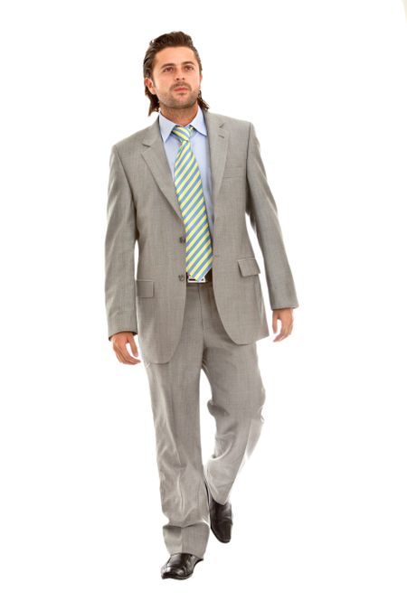 Business man walking isolated over a white background