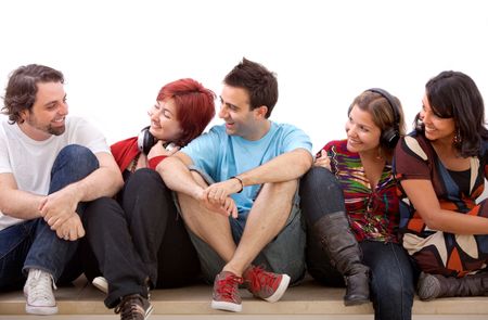 Group of friends sitting on the floor isolated