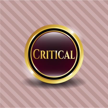 Critical golden badge or emblem