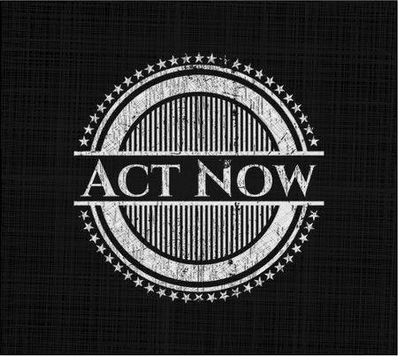 Act Now written on a chalkboard