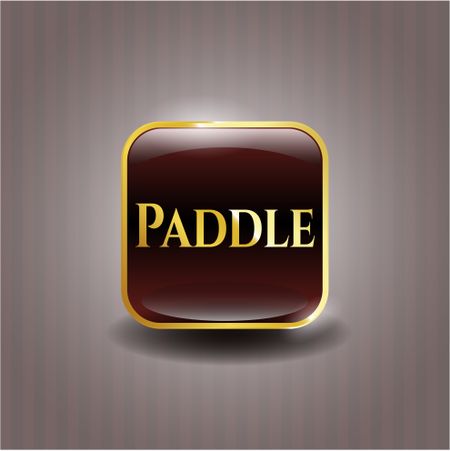 Paddle gold badge or emblem
