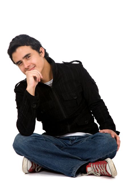casual man portrait on the floor - isolated over a white background