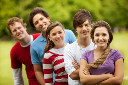 Happy Group of friends outdoors and smiling