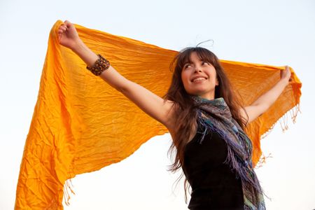 Beautiful woman outdoors with a sarong