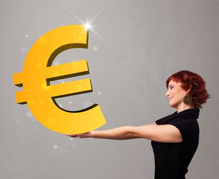 Beautiful young girl holding a big 3d gold euro sign