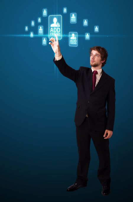 Businessman pressing modern social buttons on a virtual background