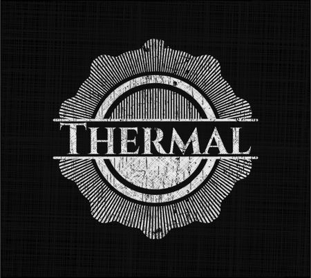 Thermal chalk emblem written on a blackboard