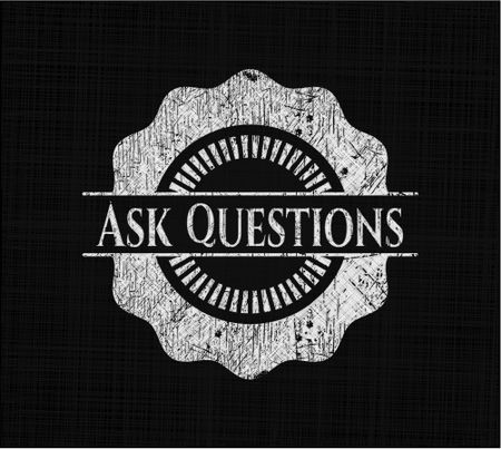 Ask Questions chalkboard emblem on black board