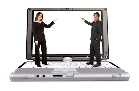 Business couple pointing at the screen of a laptop isolated
