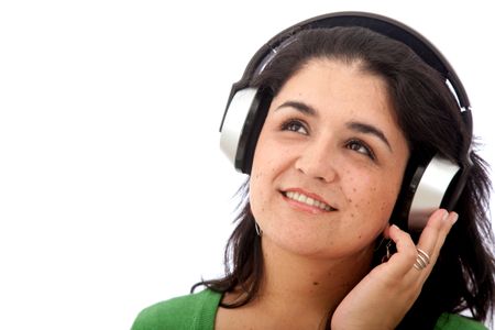 Woman with earphones smiling isolated over a white