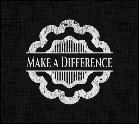 Make a Difference chalk emblem written on a blackboard