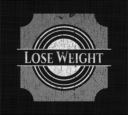 Lose Weight written on a blackboard