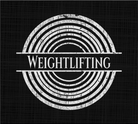 Weightlifting written on a blackboard