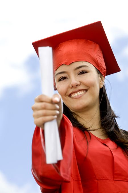 Happy graduated woman portrait with red gown