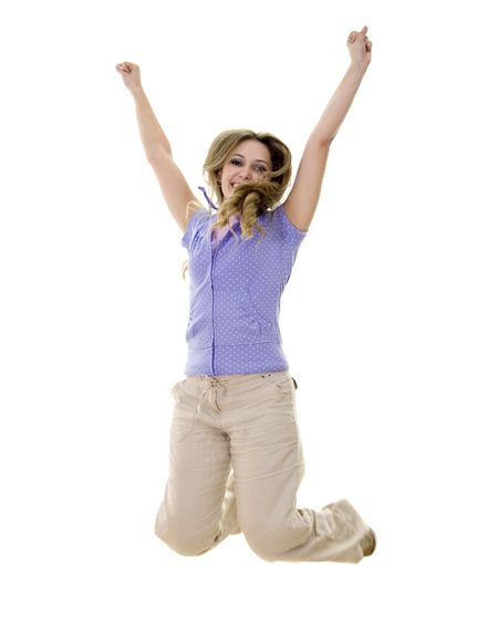 Excited woman jumping isolated over a white background